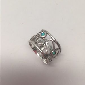 Sterling Silver .925 Band Ring w/Blue Fire Opals. Never been worn.
